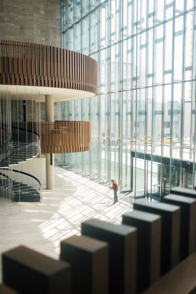 Photo by Gül Işık Man Cleaning Ataturk Cultural Center Interior in Istanbul